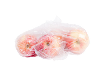 Apples in plastic bag.
