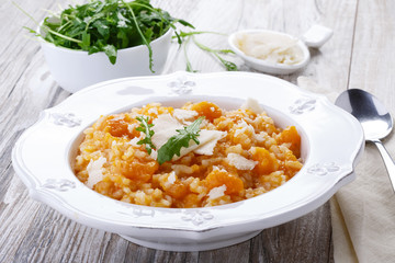 pumpkin porridge with rice and parmesan