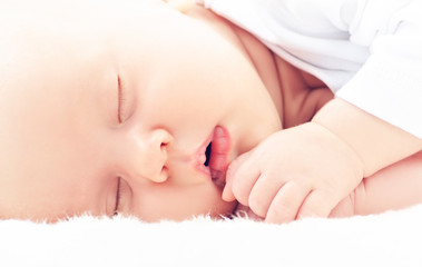 newborn baby sleeps © JenkoAtaman