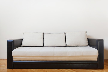 couch in white room