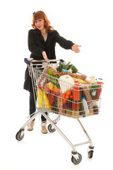 Woman with Shopping cart full dairy grocery