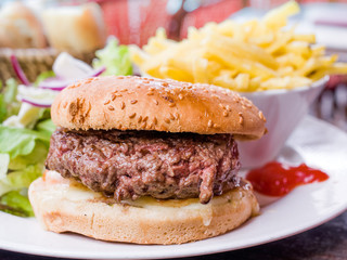 American cheese burger with fresh salad