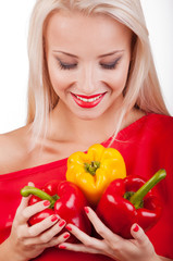 Beautiful woman with three peppers