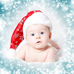 Portrait of a baby girl with Santa hat