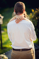 Newlyweds embracing in the most beautiful day