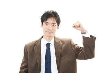 ガッツポーズのビジネスマン
