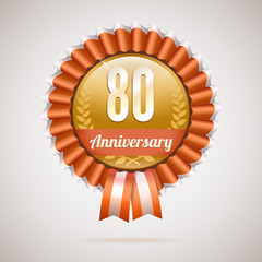 Anniversary golden badge with ribbons