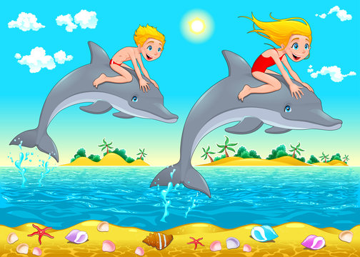 Boy, girl and dolphin in the sea.