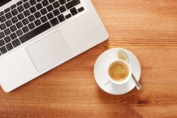 Having coffee in front of computer