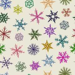 Seamless  pattern from varicolored snowflakes.