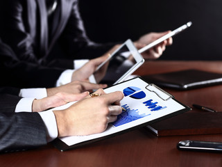 Close-up picture of businessman's hand writing