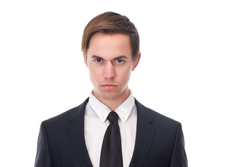Young business man with serious expression on his face