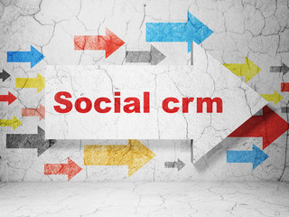 Business concept: arrow with Social CRM on wall background