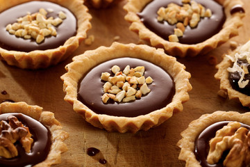 Tarts with chocolate milk and nuts