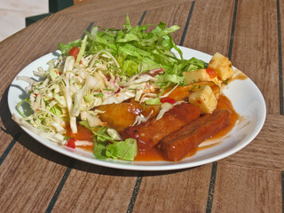 Assorted salads and meat dishes