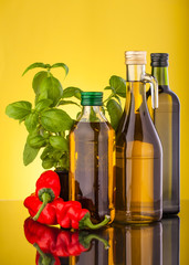 olive oil bottle ,basile and red paprika
