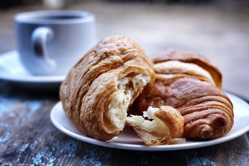 Croissant and a cup coffee