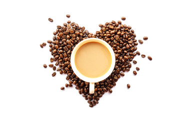 heart shaped of coffee beans and cup