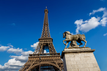 Fototapeta na wymiar Eiffel Tower and Horse Sculpture in Foreground, Paris, France