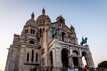 Fototapeta na wymiar Sacre Coeur Cathedral on Montmartre Hill at Dusk, Paris, France