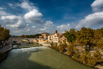 Fototapeta na wymiar View on Tiber Island and Cestius Bridge, Rome, Italy