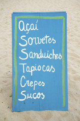 Sign Advertising Brazilian Beach Food