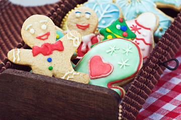 smiling gingerbread man cookies and the rest in a gift box