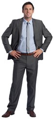 Smiling businessman with hands on hips