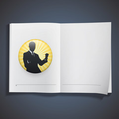 Silhouette of businessman printed on book.