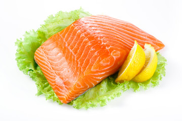 Salmon fillet with lemon isolated on white
