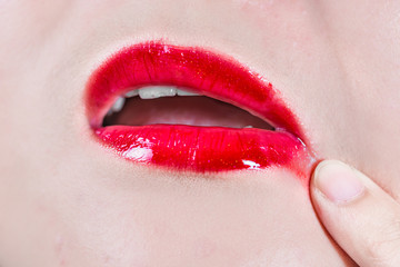 Lips with smeared lipsticks