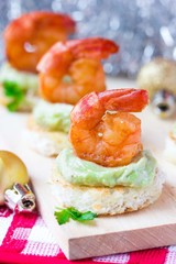 Shrimp on toast with guacamole sauce avocado, Christmas tasty
