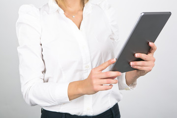 Businesswoman Using Tablet Computer on White Background