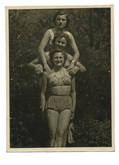 Three girls on summer break  in bathing suits  - circa 1945