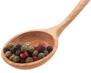 Pepper seasoning  mix in wooden spoon isolated on white backgrou