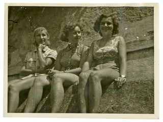 three girls on summer break (in bathing suits) - circa 1950 - 59127682