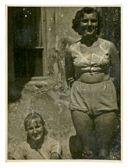 two girls on summer break (in bathing suits) - circa 1950