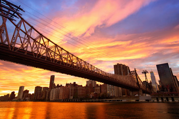 Manhattan skyline and Queensboro Bridge at sunset, New York