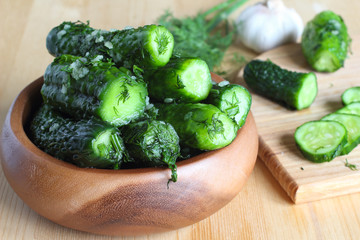 Fresh cucumbers with salt, garlic and dill