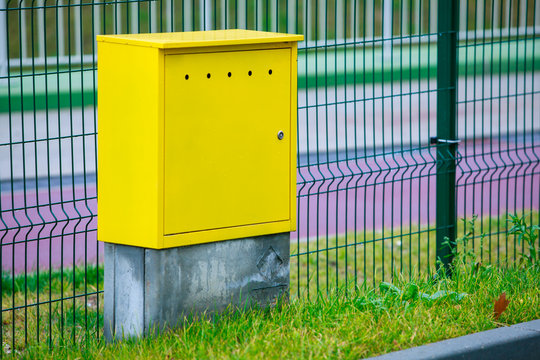 Yellow Electric Control Box Outdoor. Urban Power And Energy.