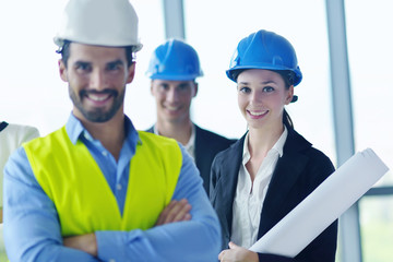 business people and engineers on meeting