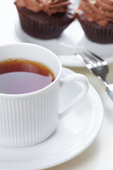 Drink tea with cupcakes