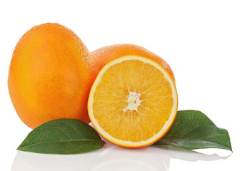 Fresh orange fruit with green leaves isolated on white backgroun