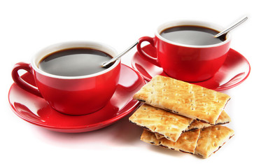 Red cups of strong coffee and cookies isolated on white