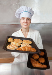 Baker with fresh pastries