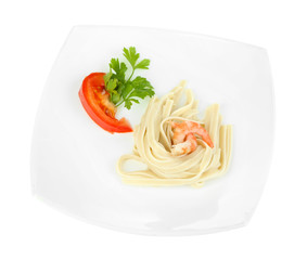 Pasta with shrimps on white plate, isolated on white