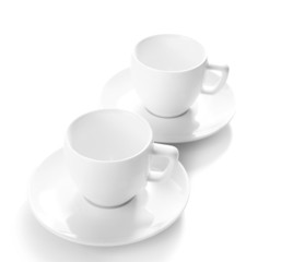 White cups isolated on white