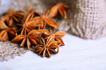 Star anise on wooden background