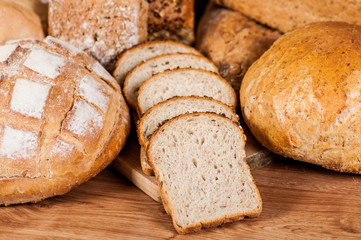 Group of different bread's type on wooden table