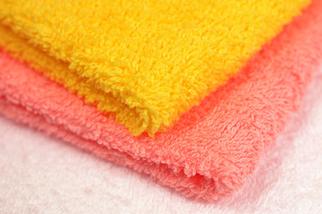 Yellow and pink towel